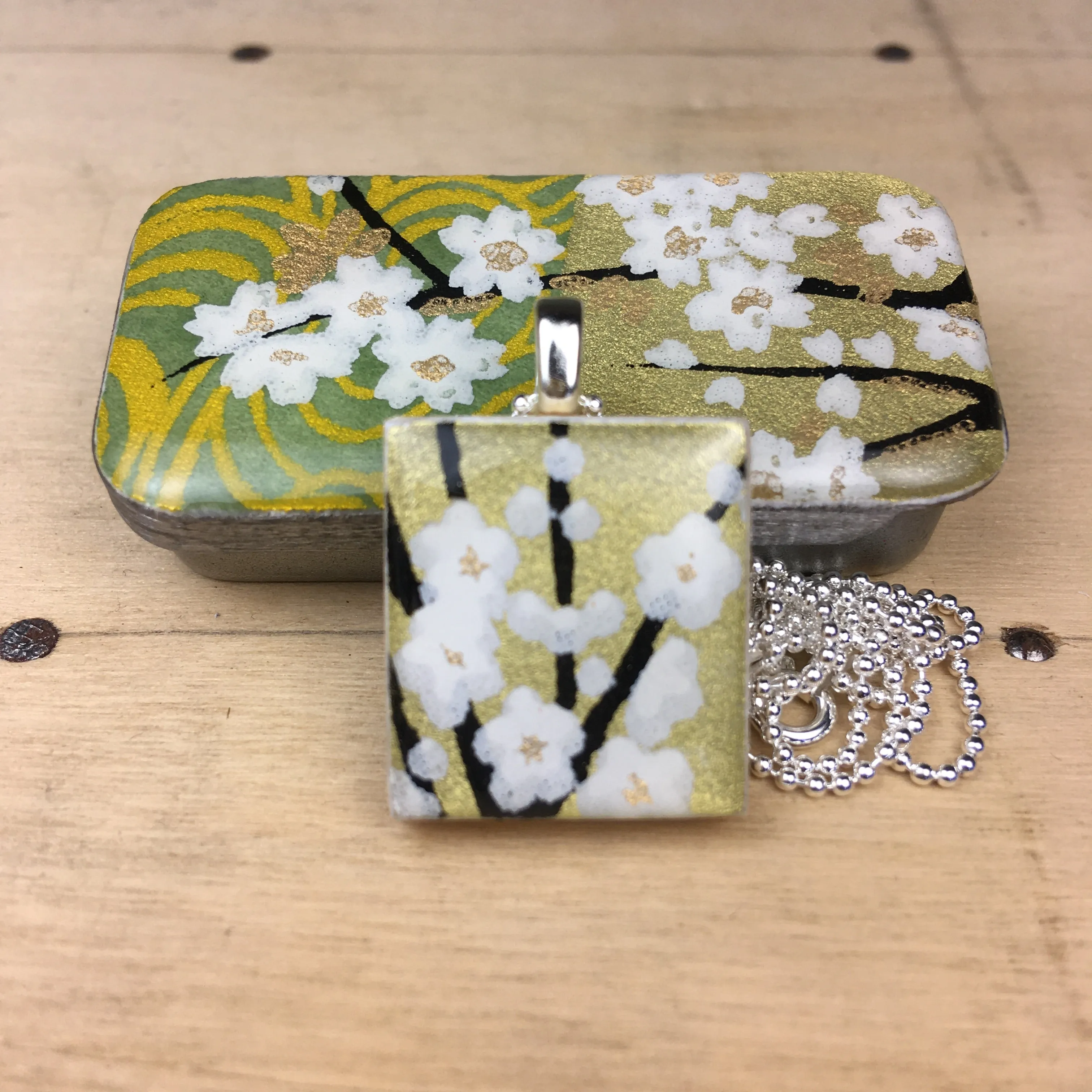 A Scrabble Tile Pendant and Teeny Tiny Tin Golden Green