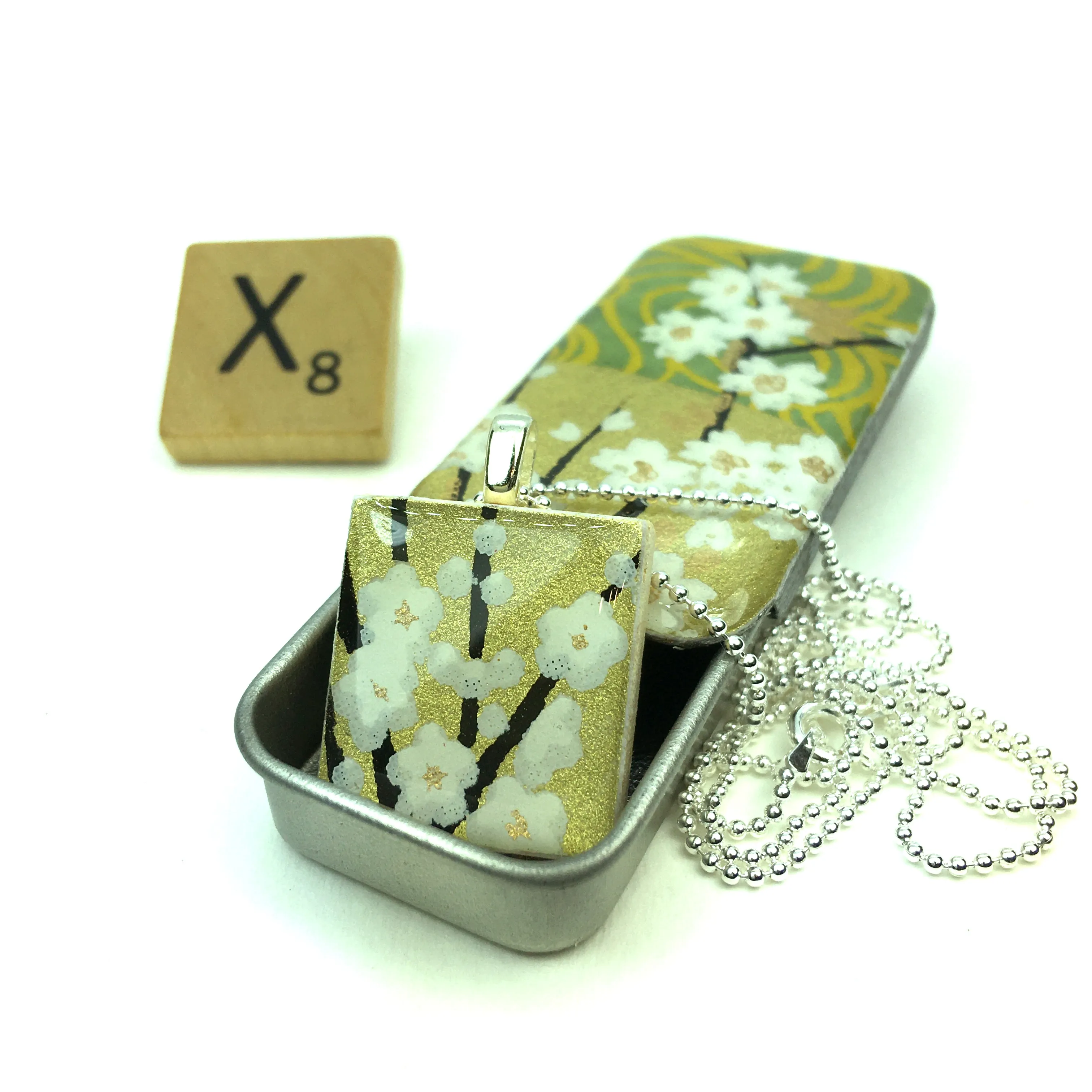 A Scrabble Tile Pendant and Teeny Tiny Tin Golden Green